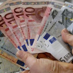 15927919-COPENHAGEN-DENMARK--Euros-notes-but-euro-lands-are-in-financial-ciris-Spain-greece-and-Portugal-and--Stock-Photo